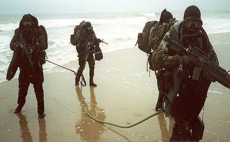 Soldiers on Beach — Brown