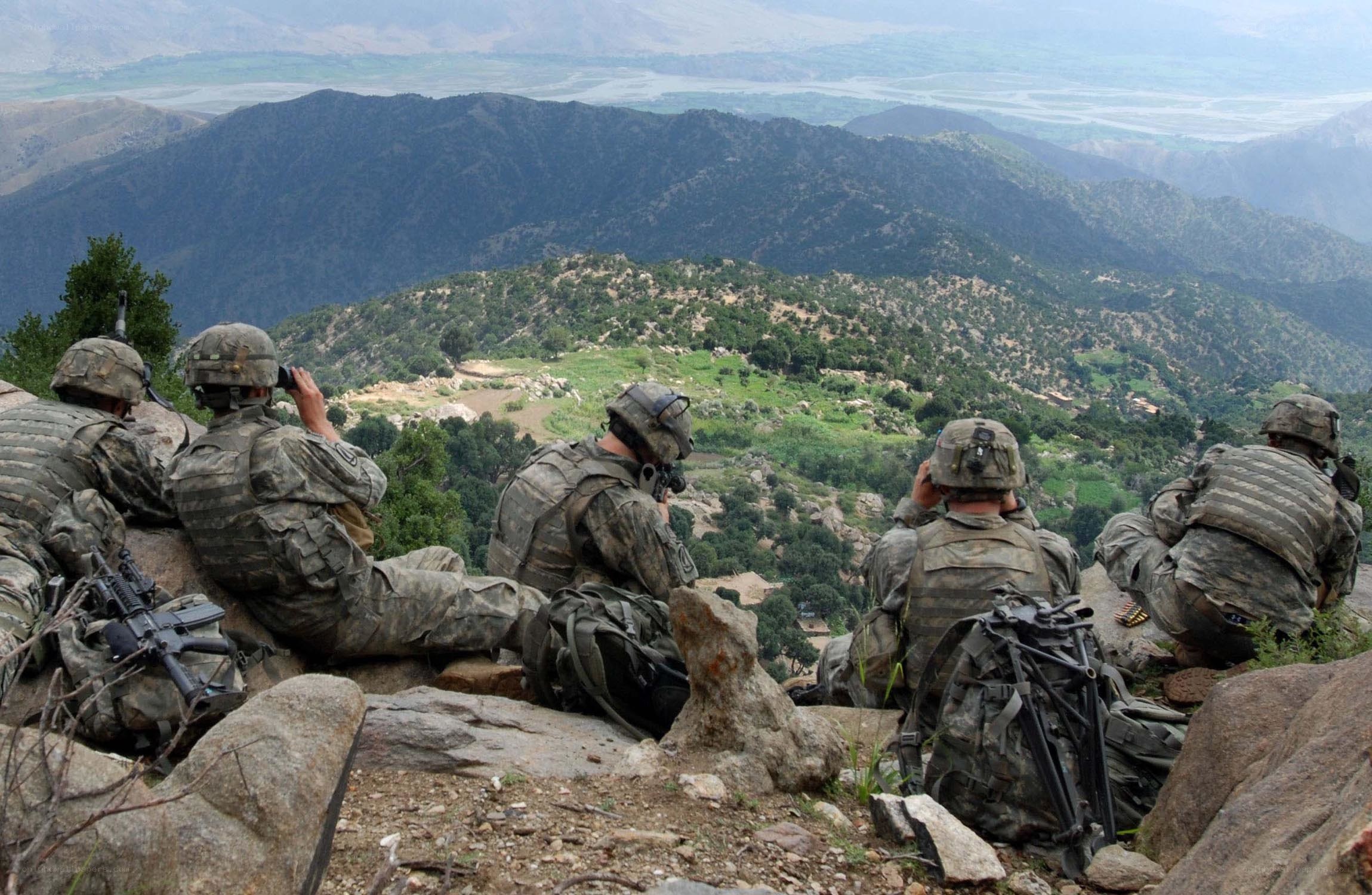 Soldiers on mountain surveillance