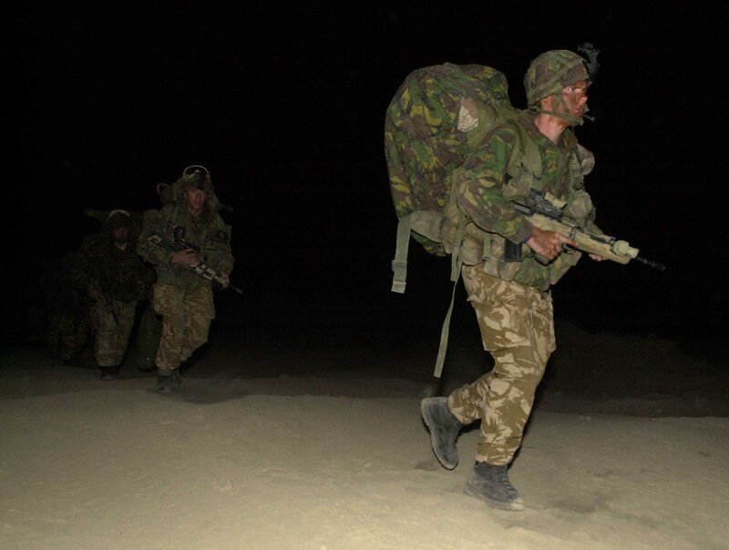 Soldiers on patrol at night