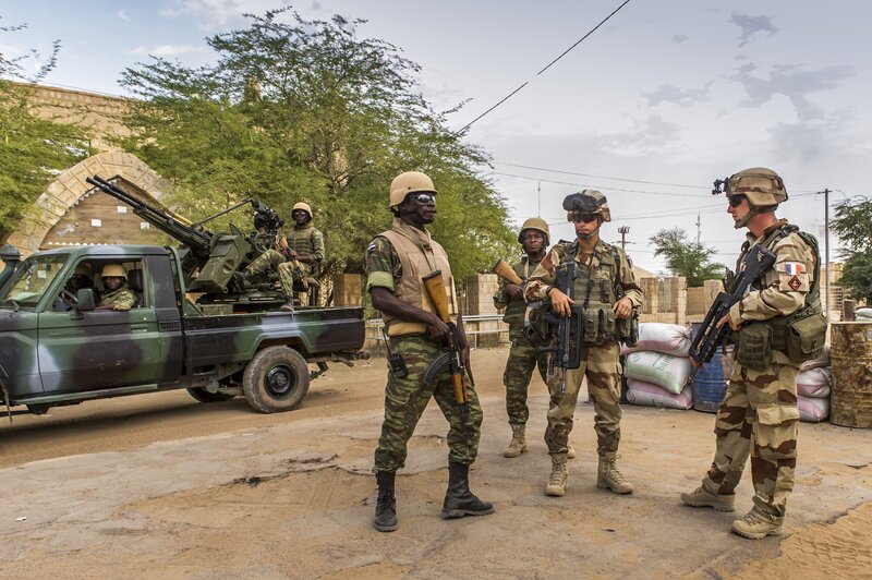 Soldiers on patrol in a conflict zone
