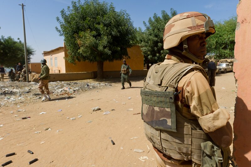 Soldiers on patrol in a conflict zone