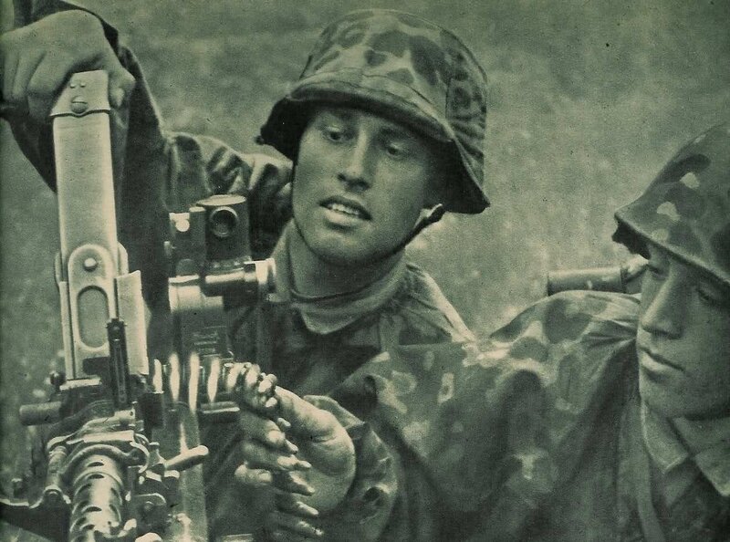Soldiers operating a machine gun
