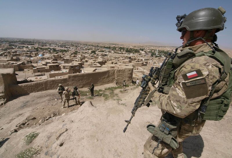Soldiers overlooking a town