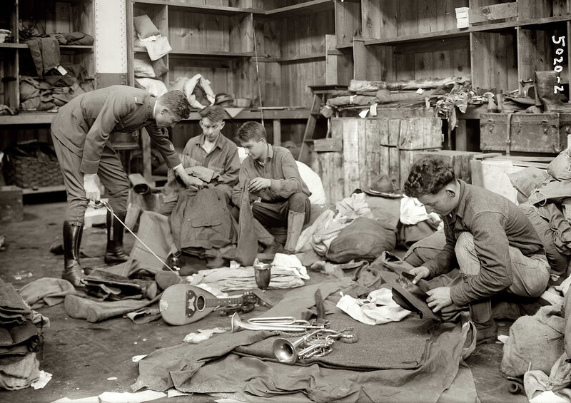 Soldiers packing gear in a barracks