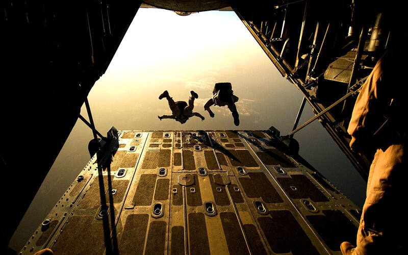 Soldiers Parachuting from Plane — Black