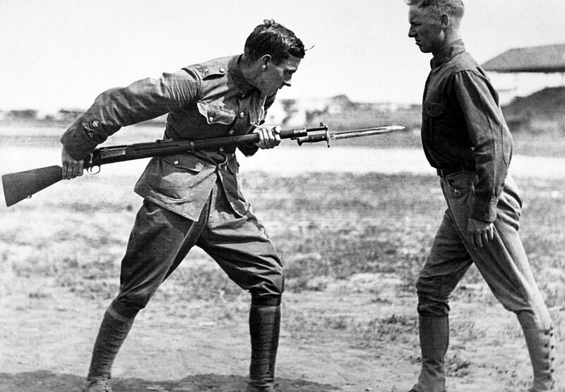 Soldiers practicing bayonet combat