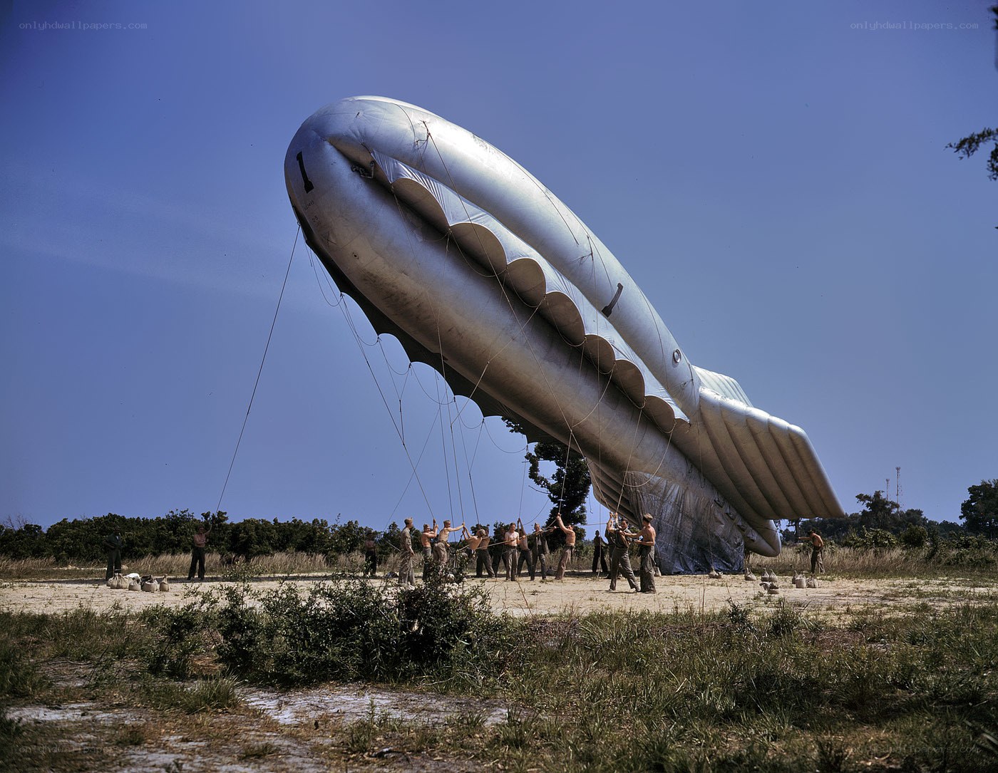 Soldiers preparing a blimp