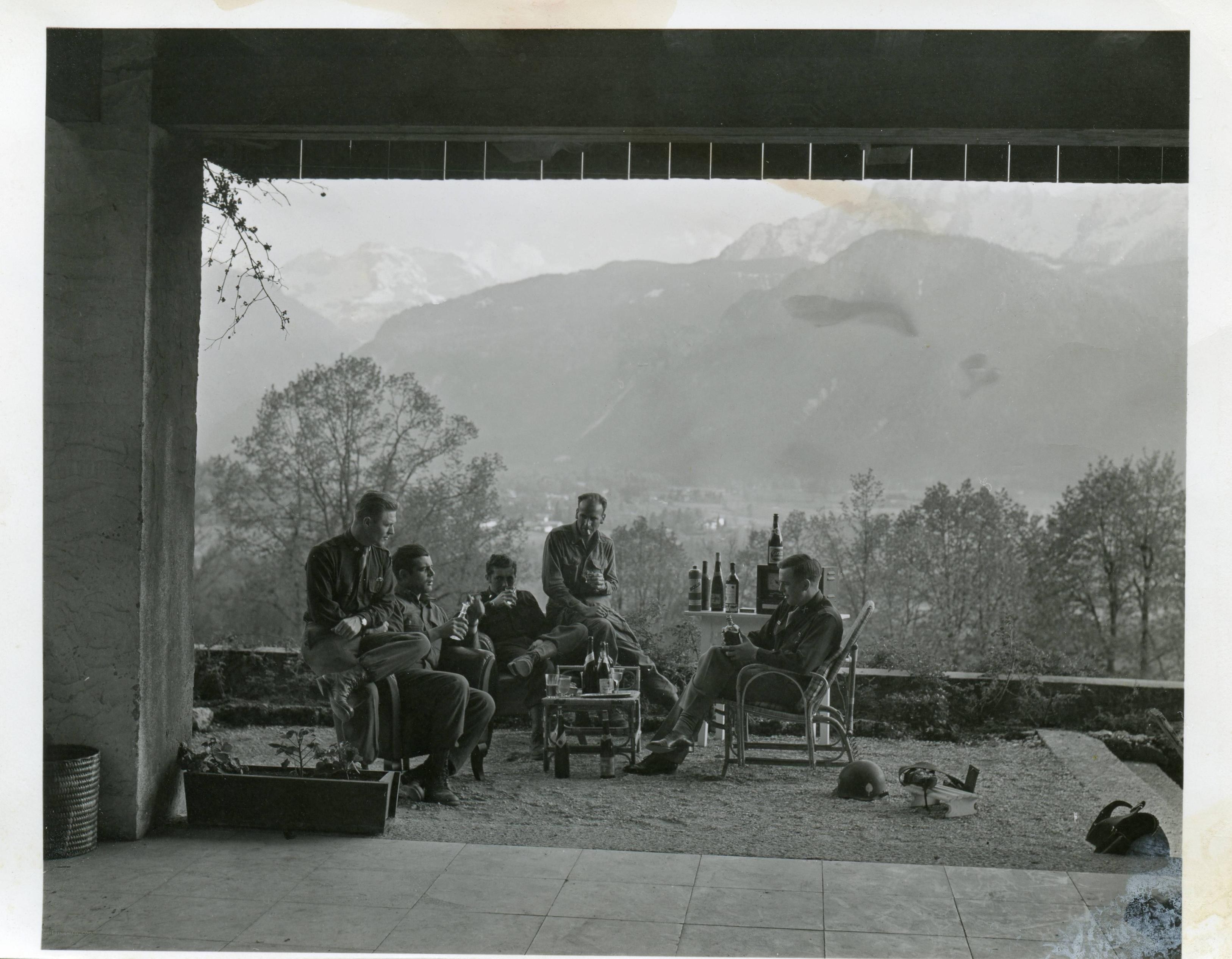 Soldiers relaxing with drinks