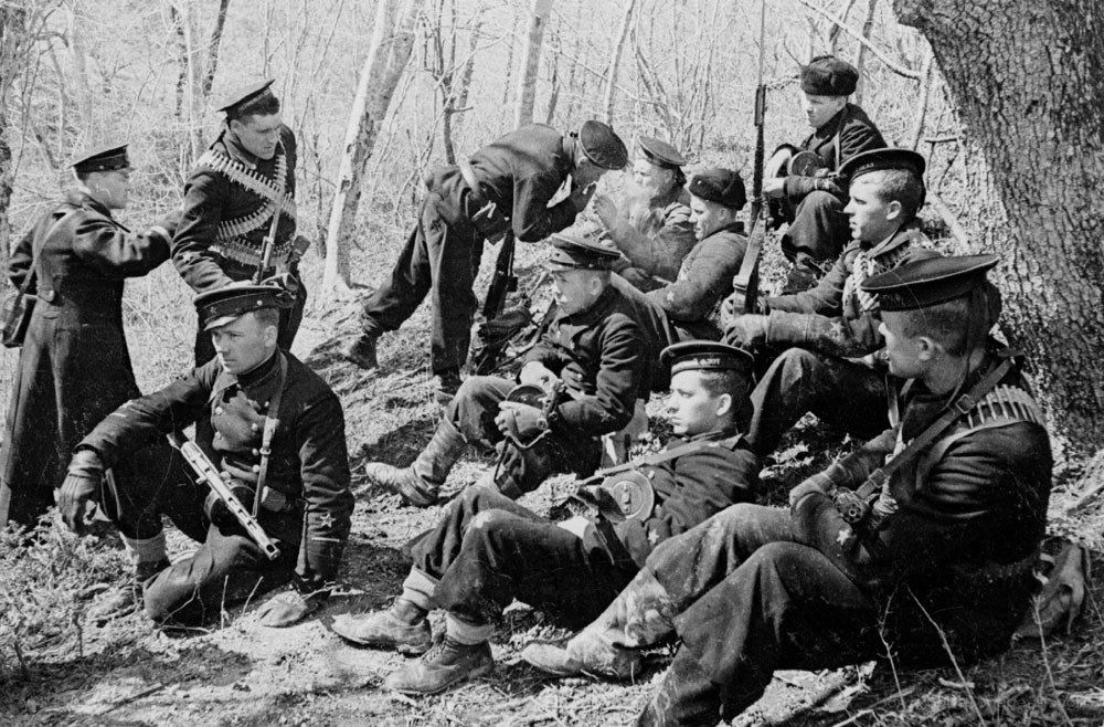 Soldiers resting in forest