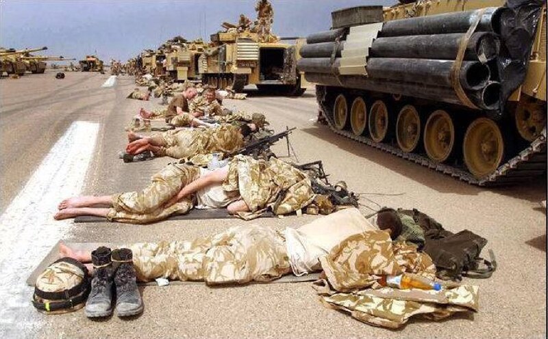 Soldiers Resting on Road