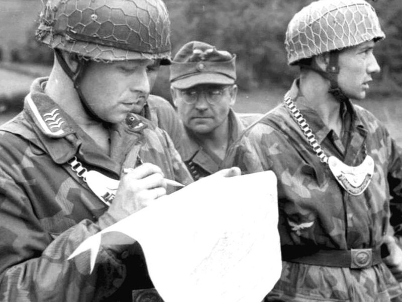 Soldiers reviewing a map