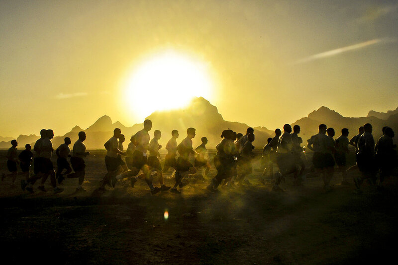 Soldiers Running at Sunrise