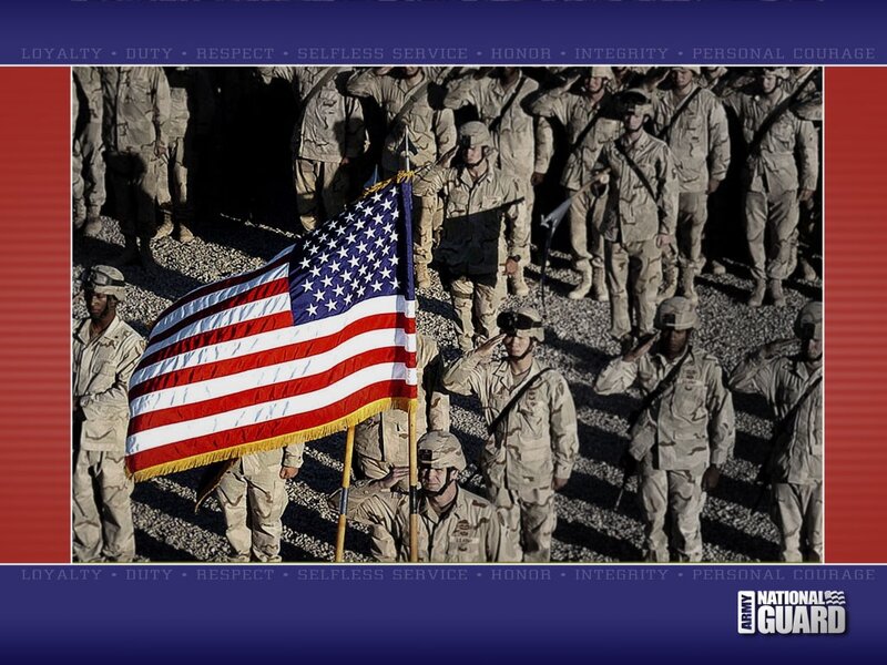 Soldiers saluting flag