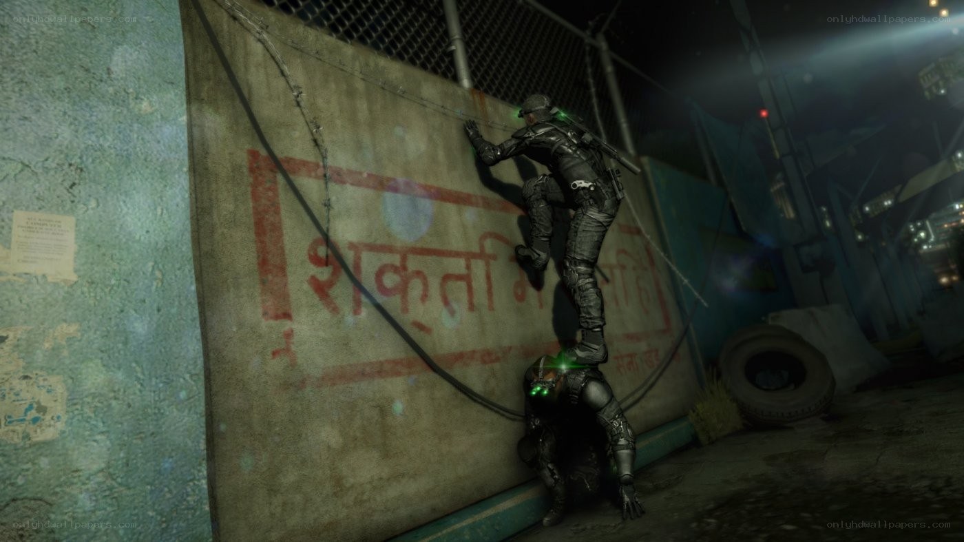 Soldiers scaling a wall at night