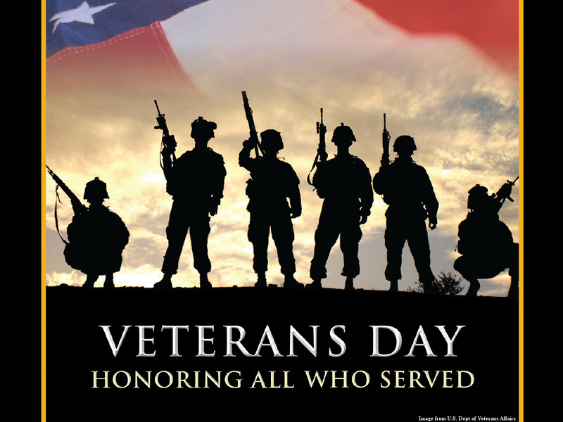 Soldiers Silhouetted Against Flag