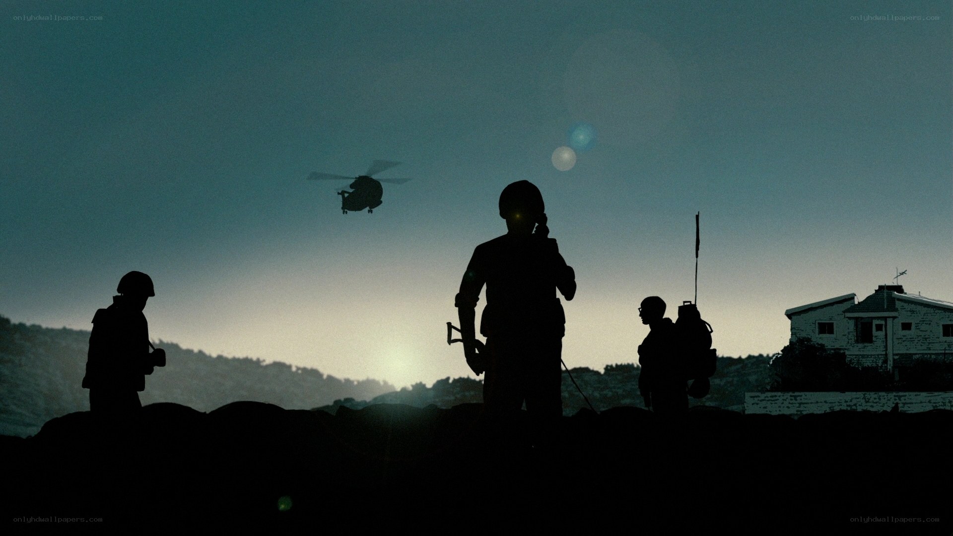 Soldiers silhouetted at dusk