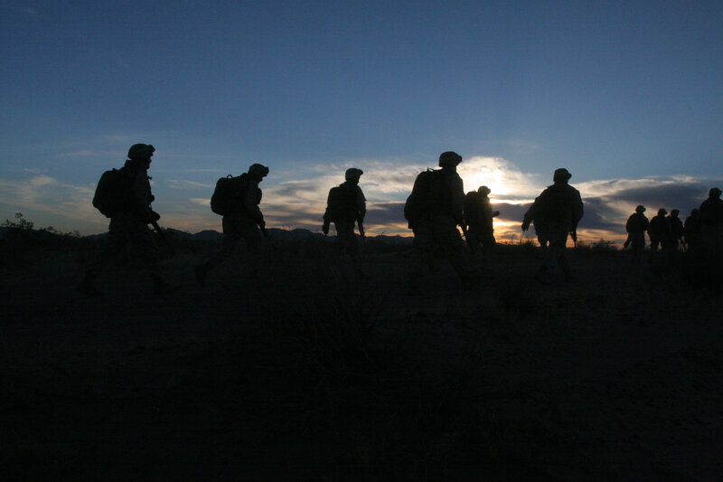 Soldiers Silhouetted at Dusk — Blue