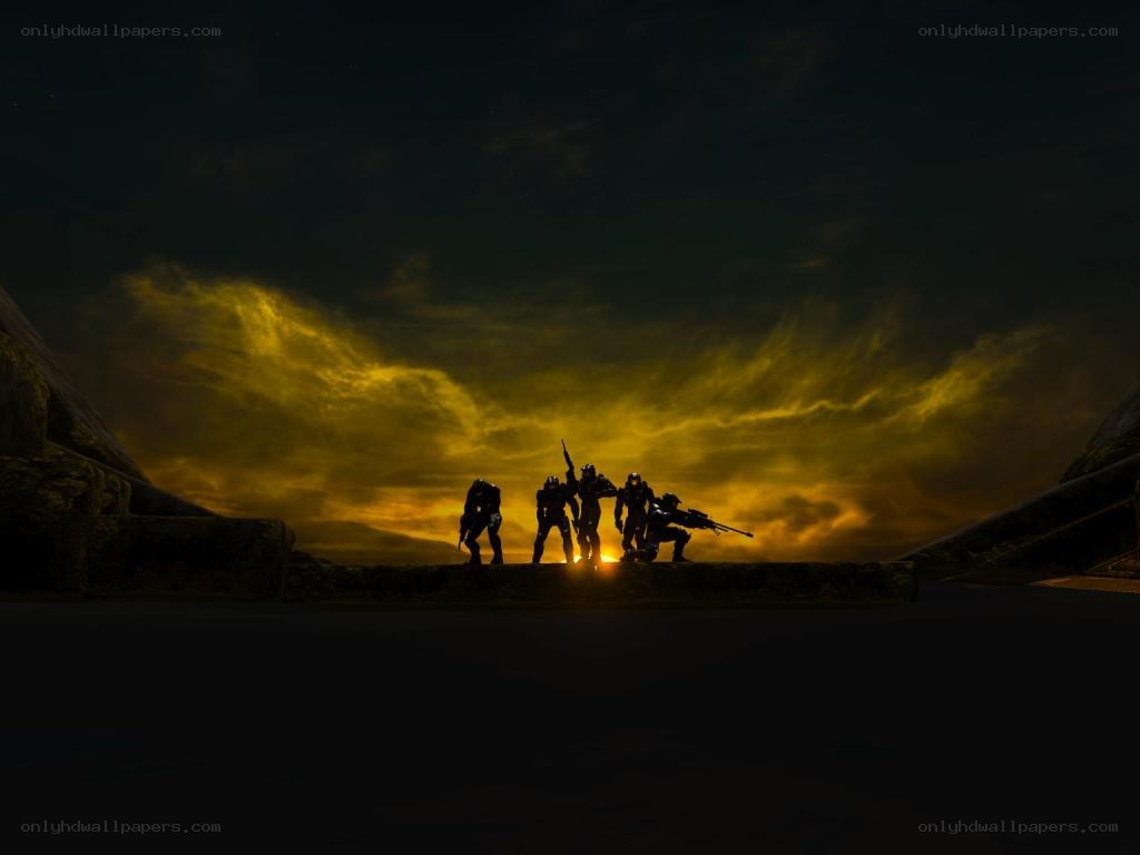 soldiers silhouetted at sunset