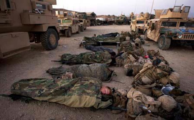 Soldiers Sleeping on Ground — Brown