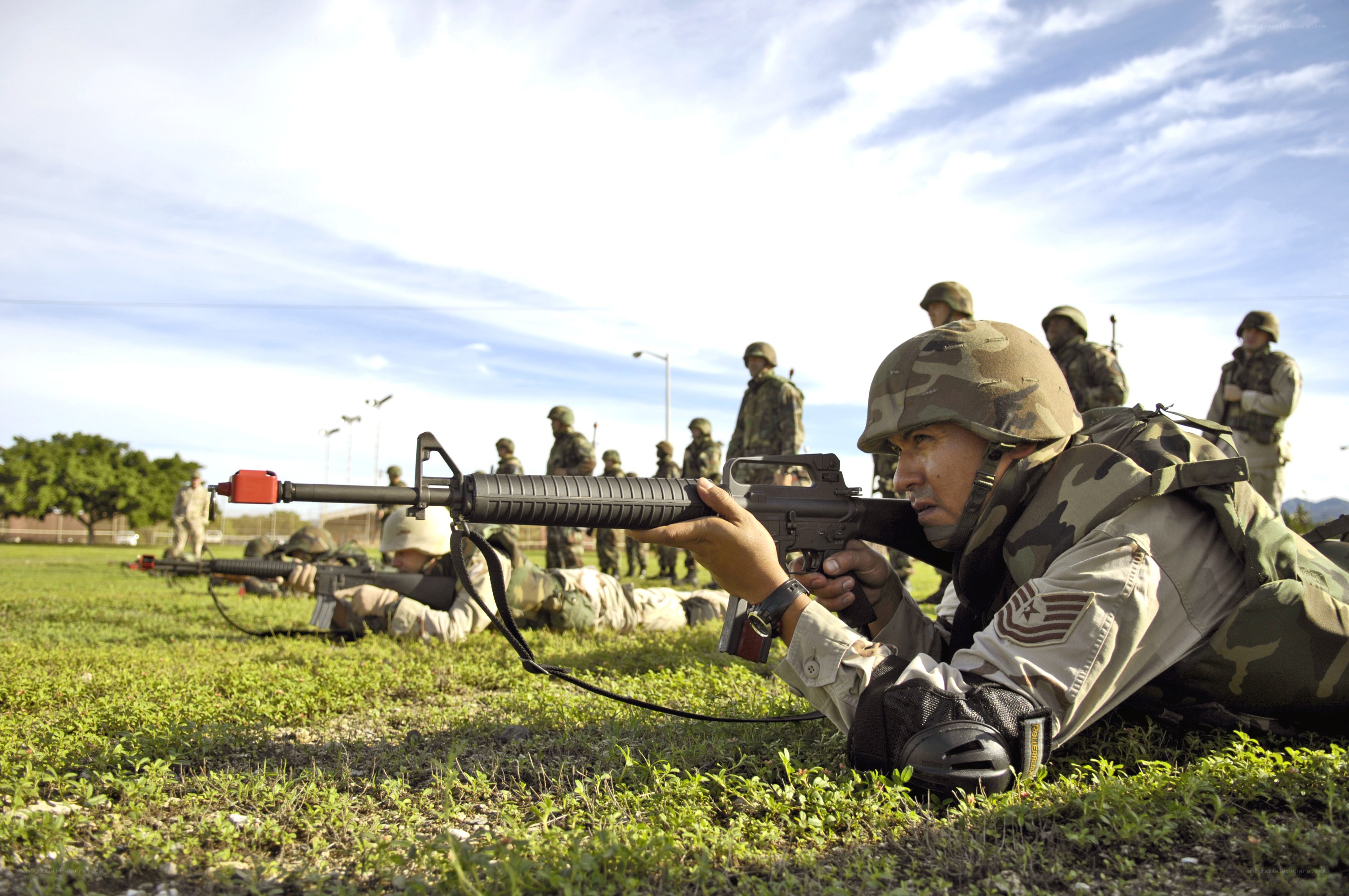 Soldiers training with rifles