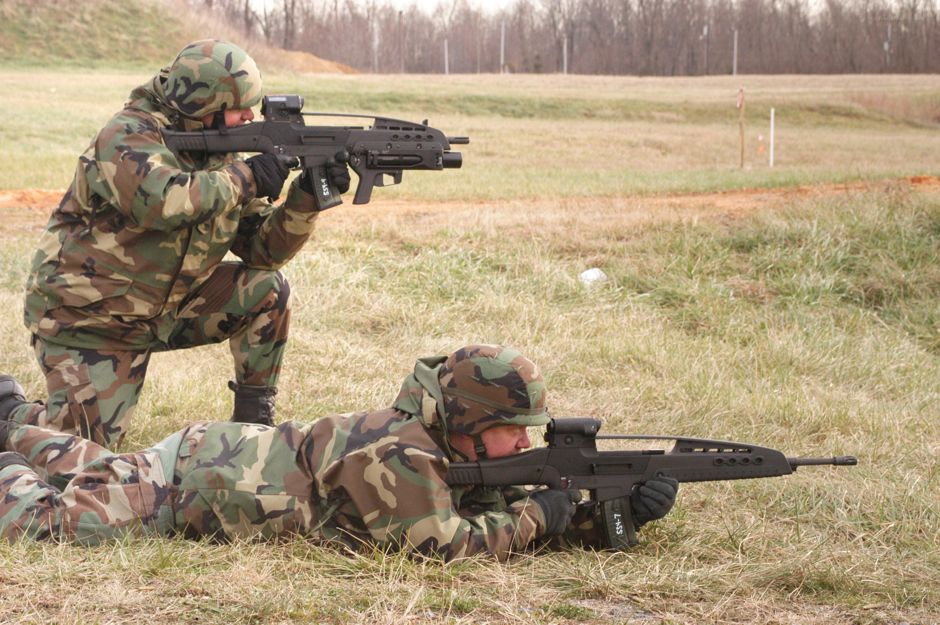 Soldiers training with rifles