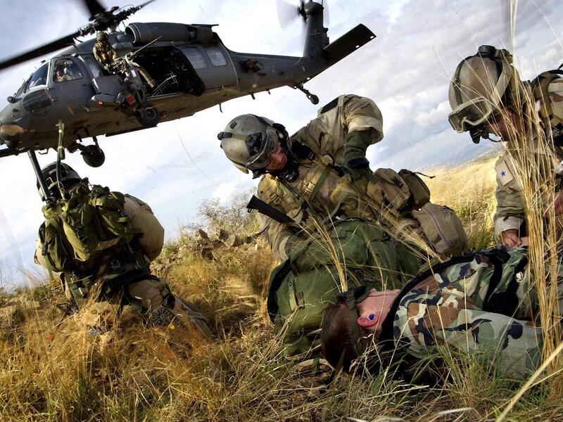 Soldiers Treating Wounded