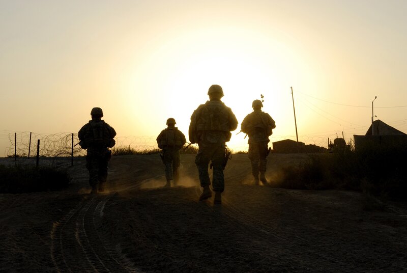 Soldiers Walking at Sunset — Yellow, Dramatic, Photograph