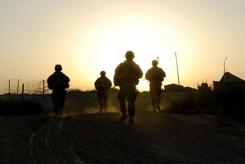 Soldiers Walking at Sunset — Yellow, Dramatic