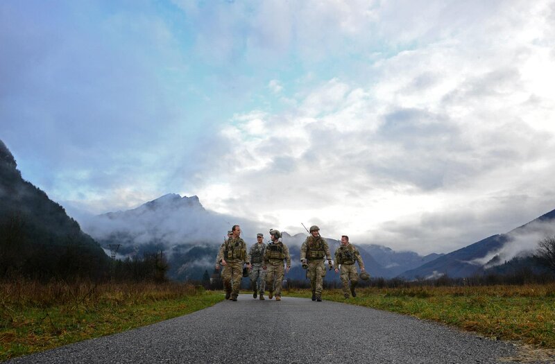 Soldiers Walking on Road