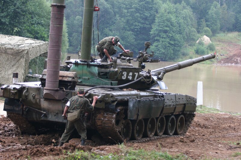 Soldiers with a tank near water