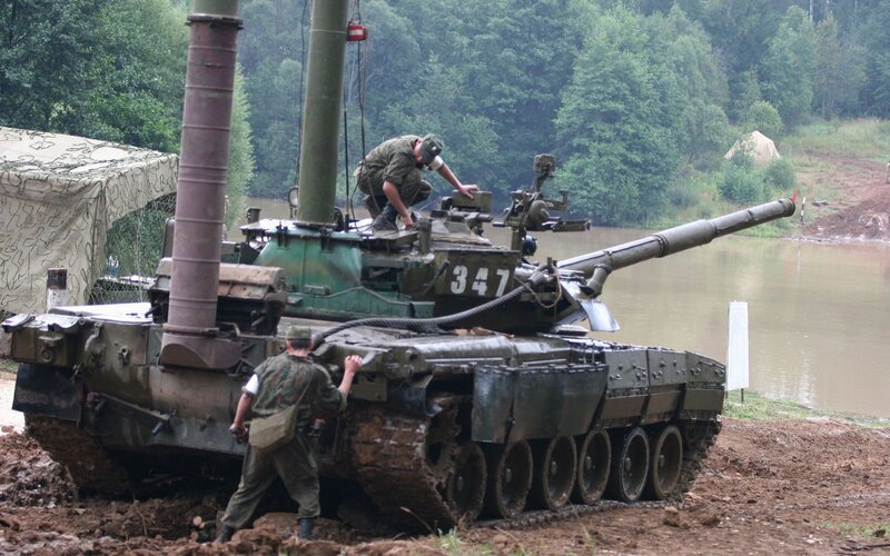 Soldiers with a tank near water