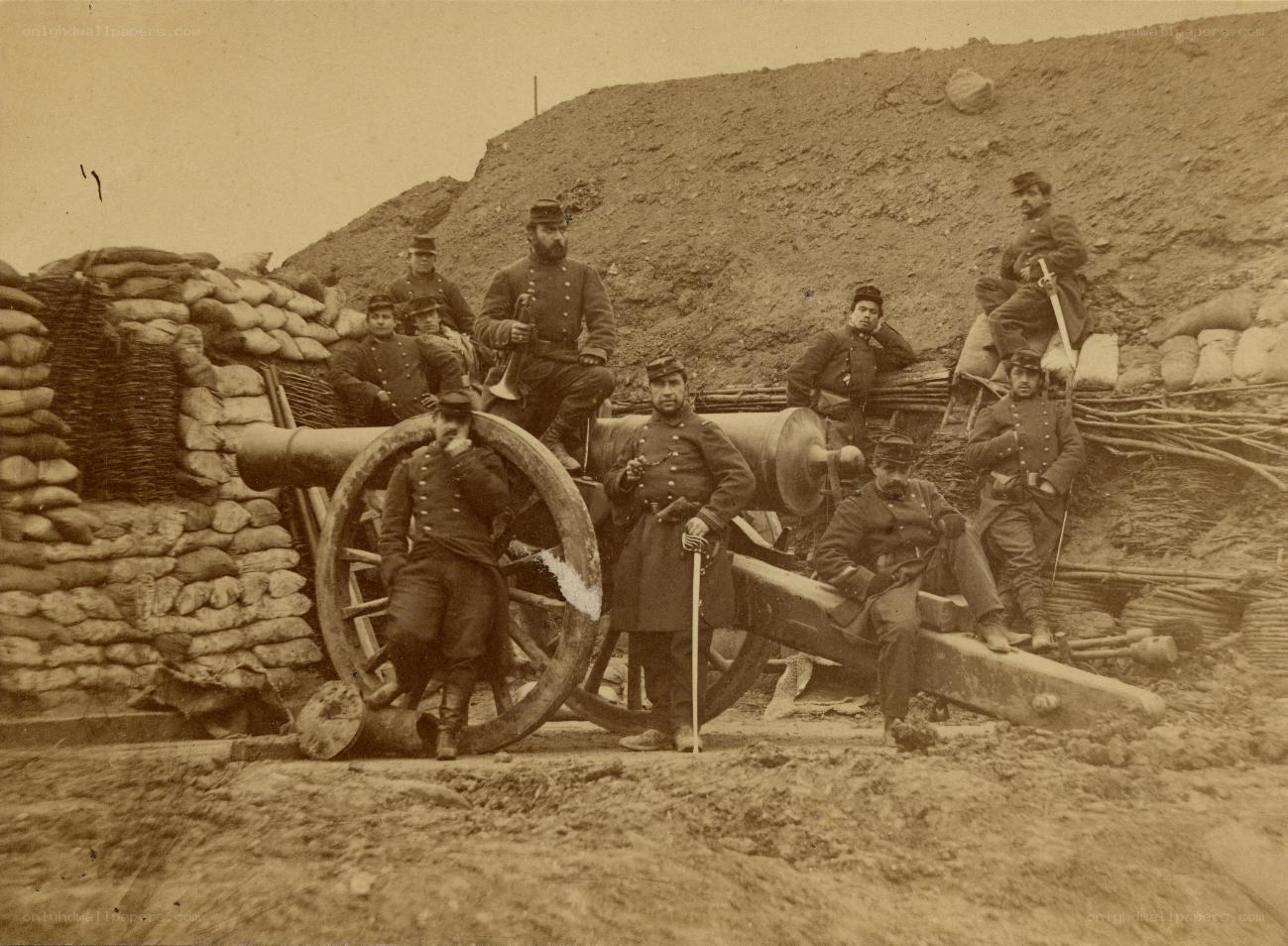Soldiers with cannon in trench