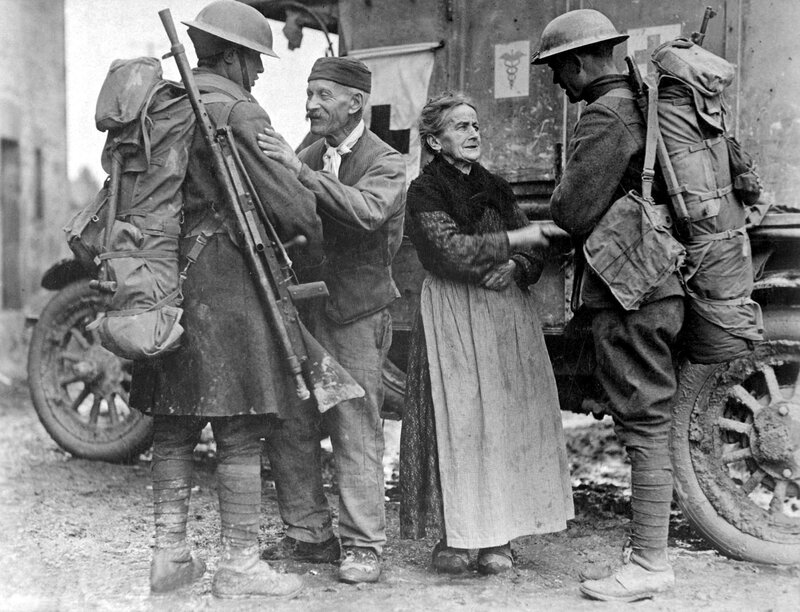 Soldiers with civilians in war