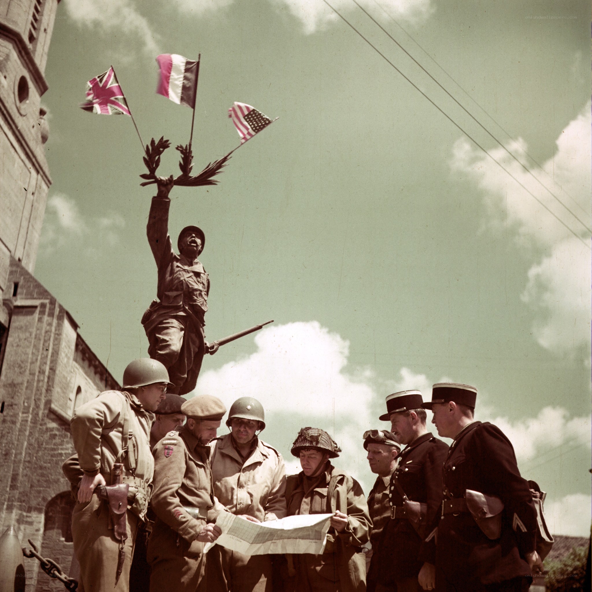 Soldiers with map near statue
