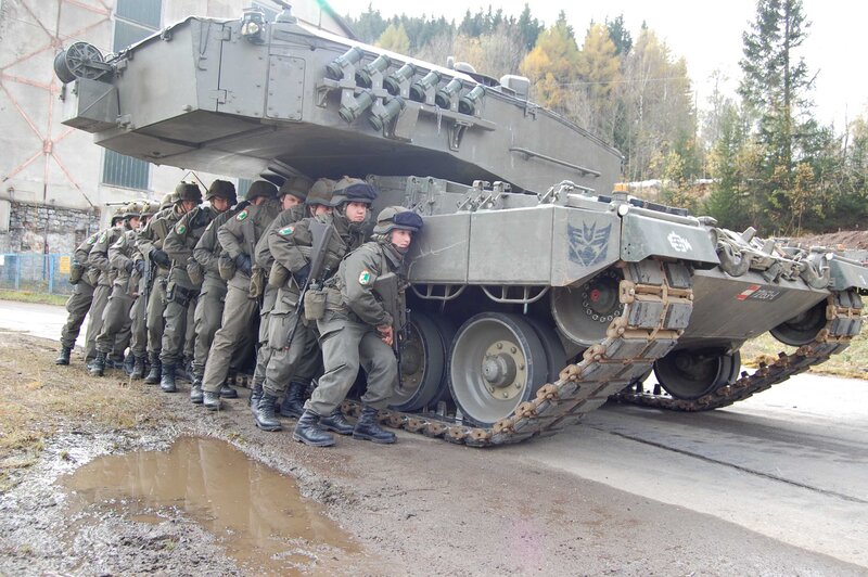 Soldiers with military tank