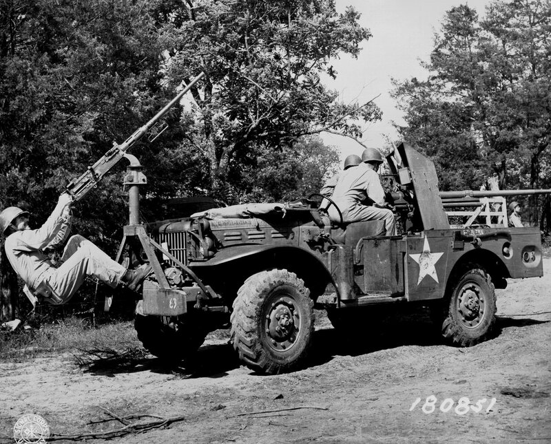 Soldiers with military vehicle