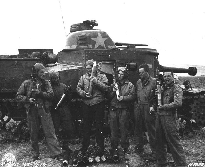 Soldiers with tank and munitions