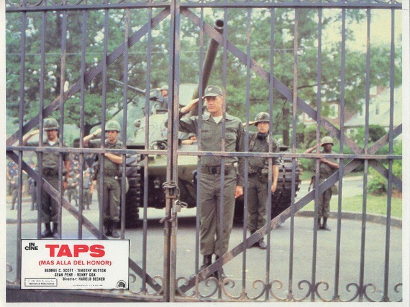 Soldiers with Tank Behind Gate