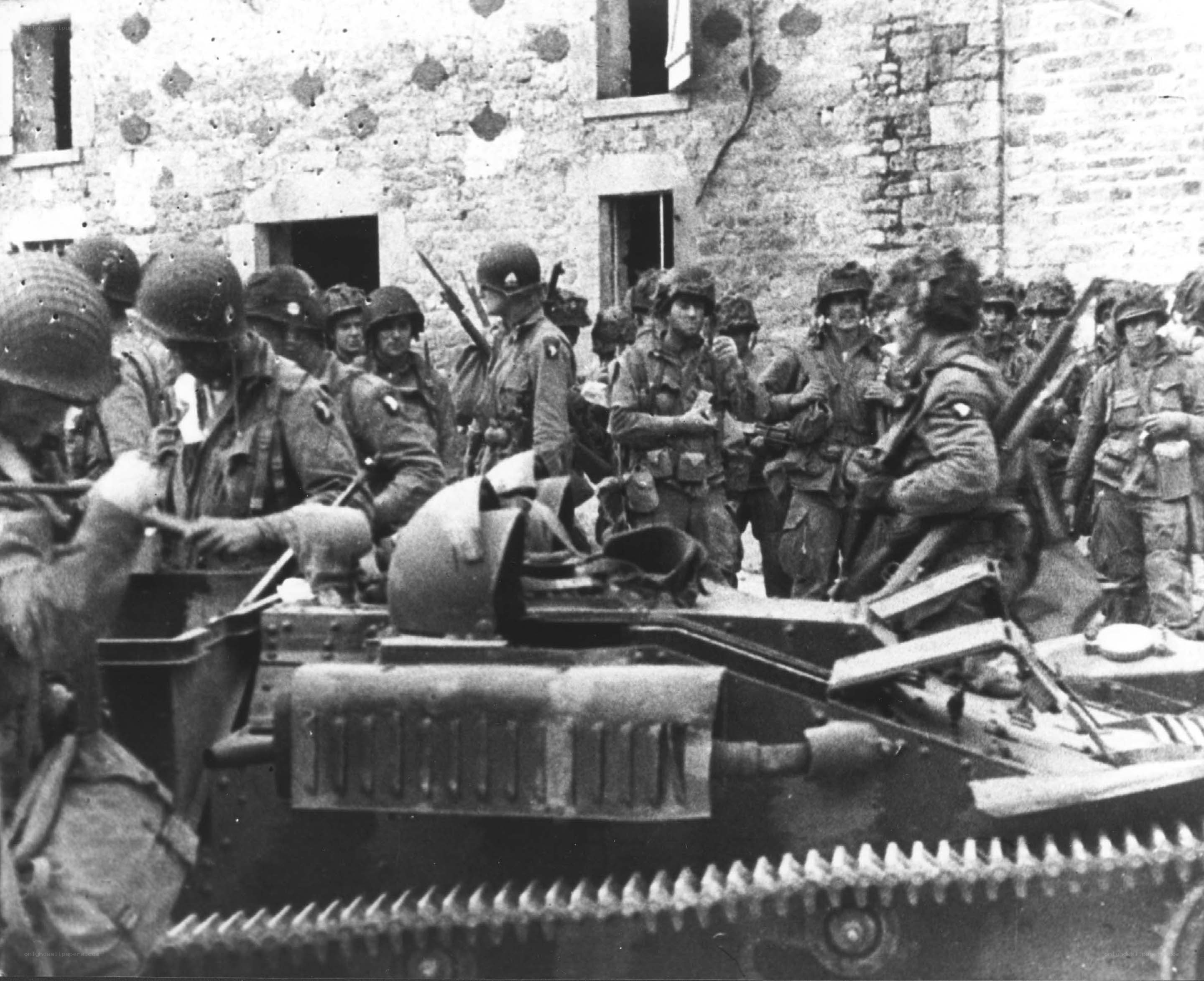 Soldiers with tank in town