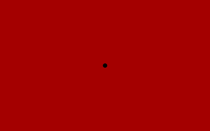 solid red background with black dot