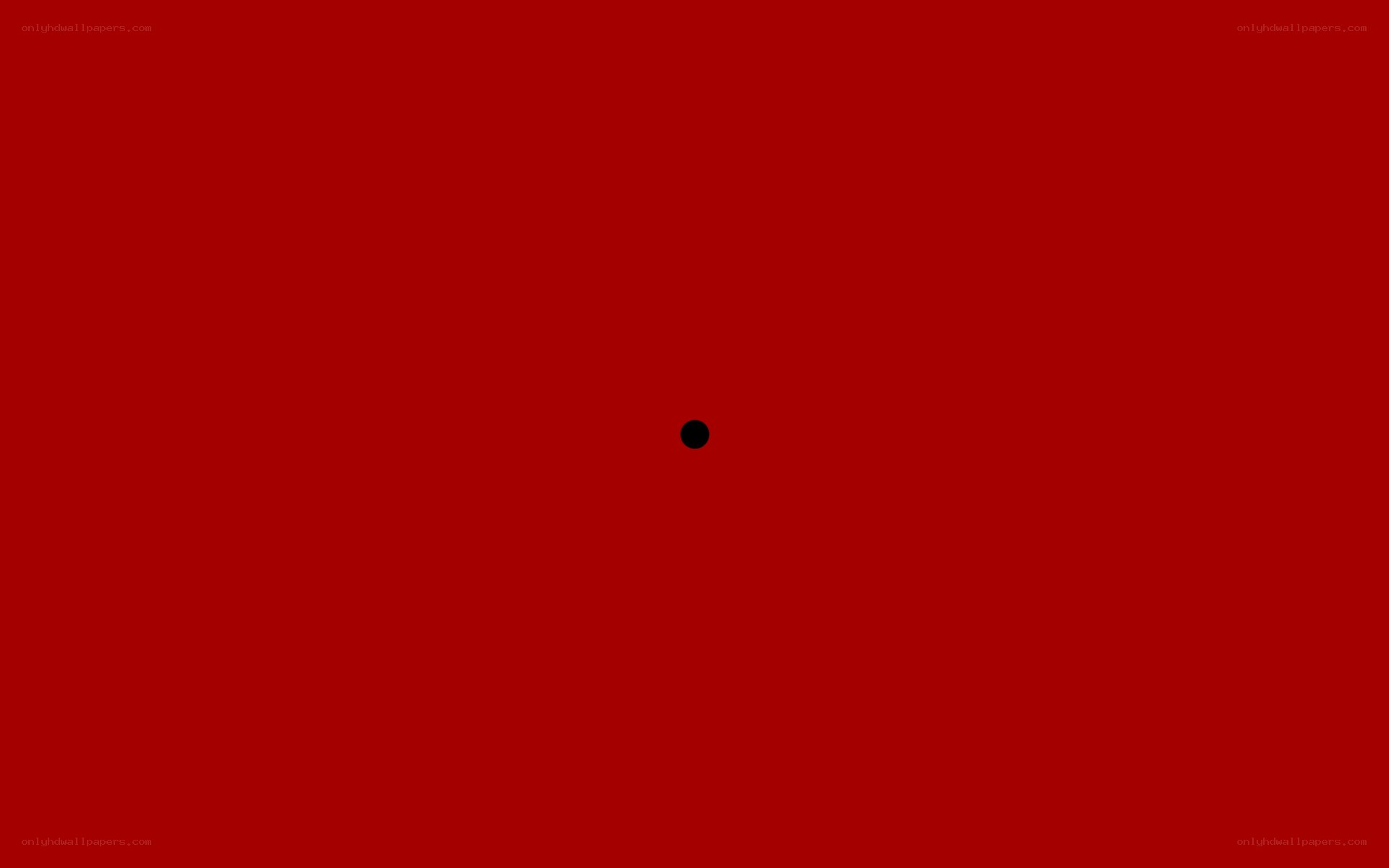 solid red background with black dot