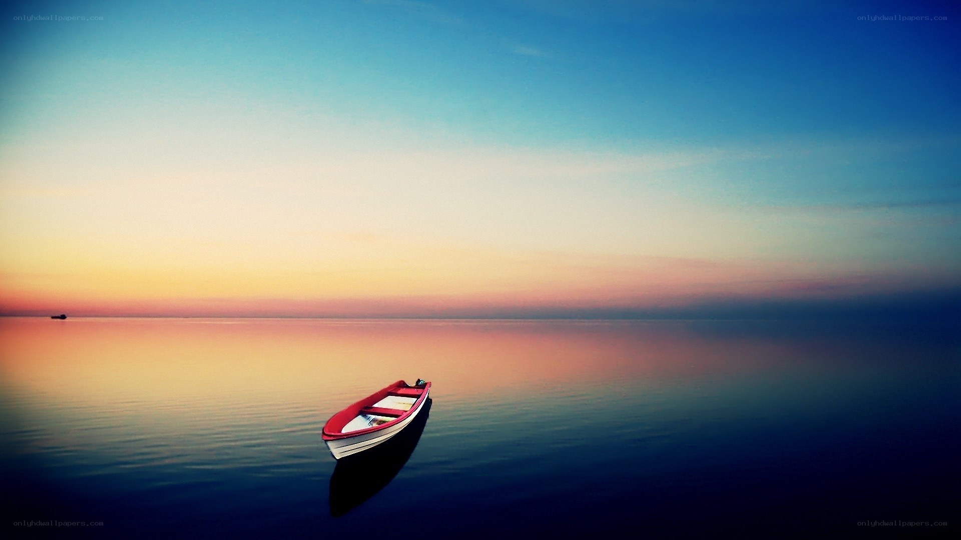 Solitary boat at sunset