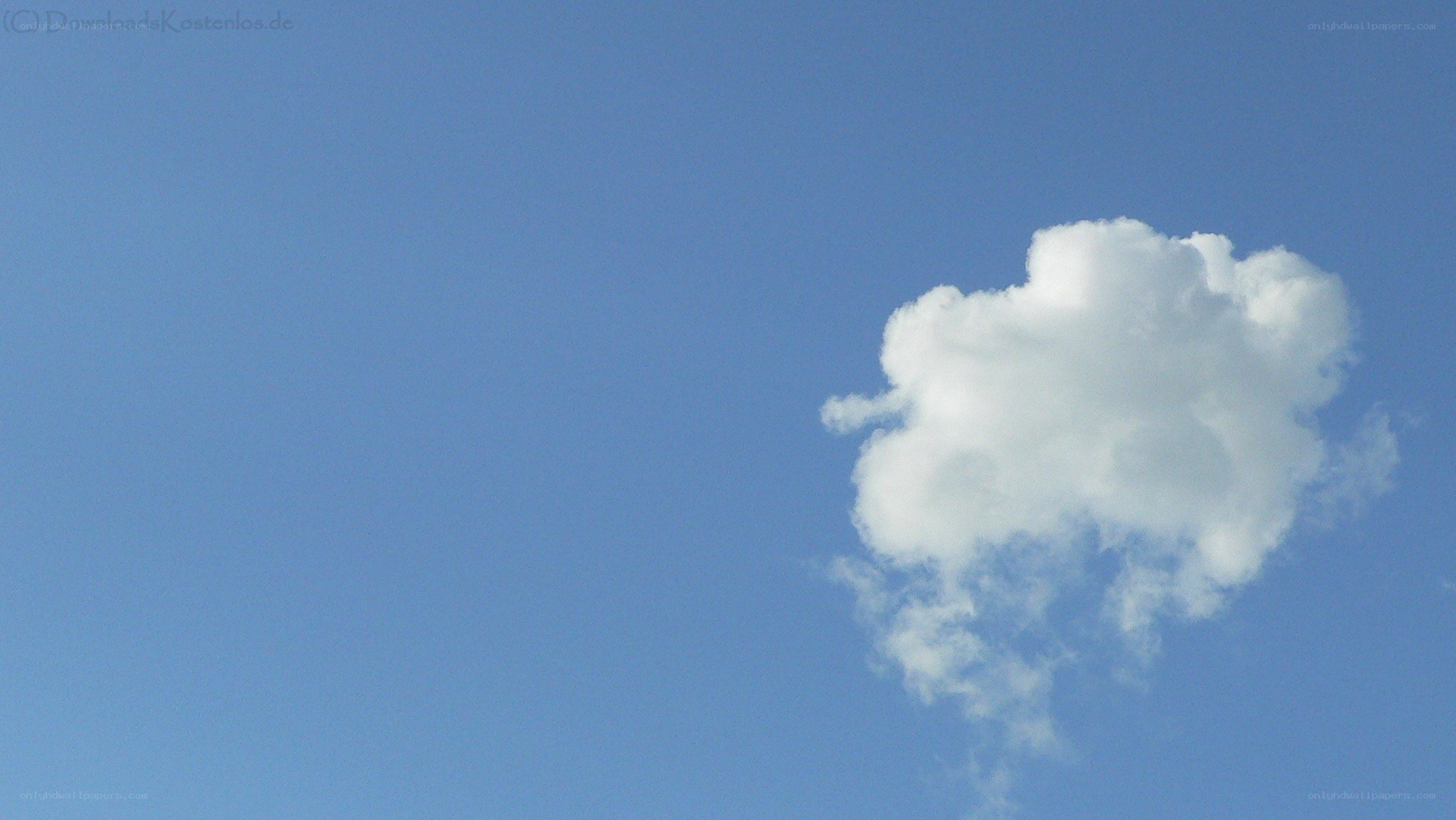 solitary cloud in blue sky
