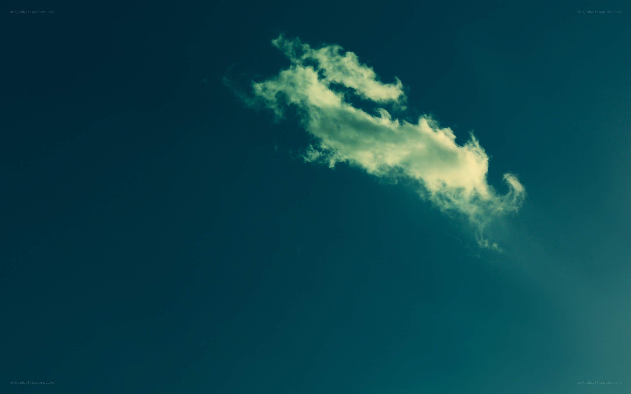 solitary cloud in blue sky