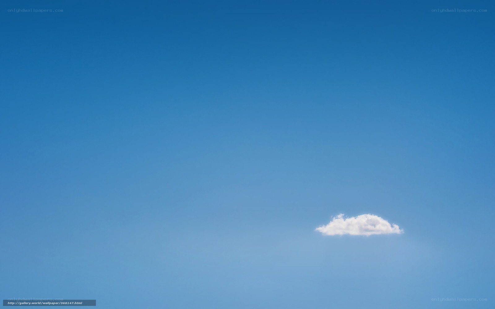 solitary cloud in blue sky