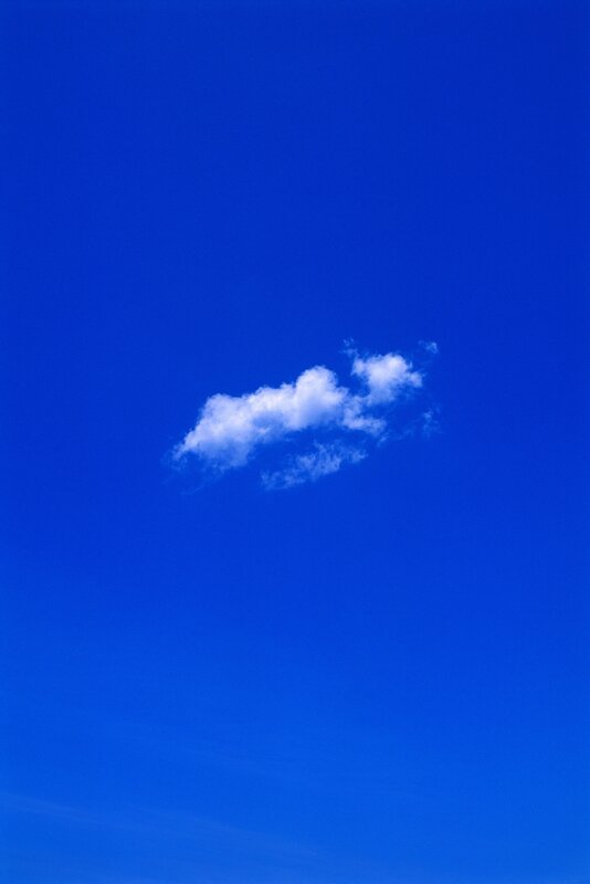 solitary cloud in blue sky