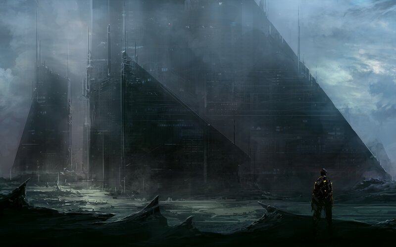 solitary figure before pyramid city