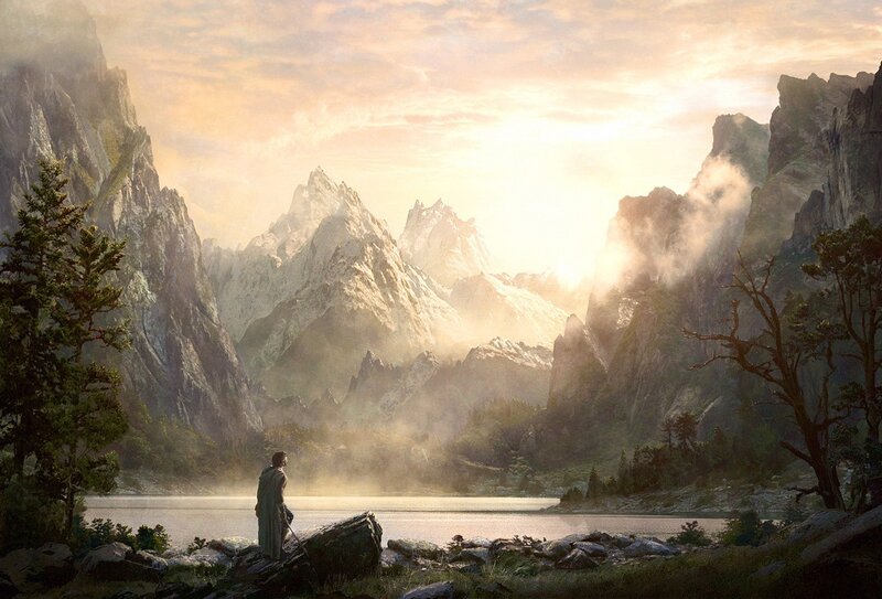 Solitary figure by a mountain lake