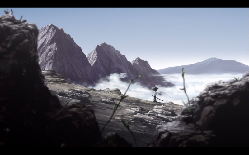 solitary figure on mountain peak
