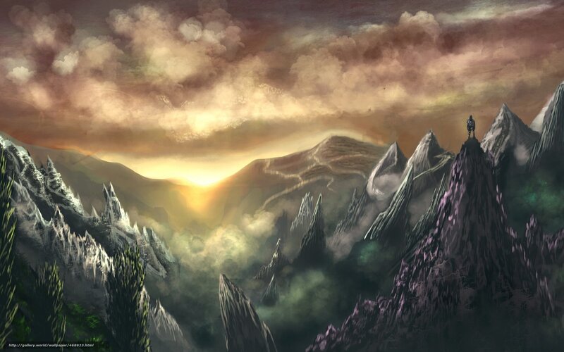 Solitary figure on mountain peak